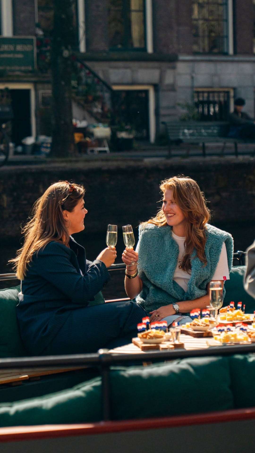 Sun on your face, prosecco in your hand, Amsterdam canals all around.