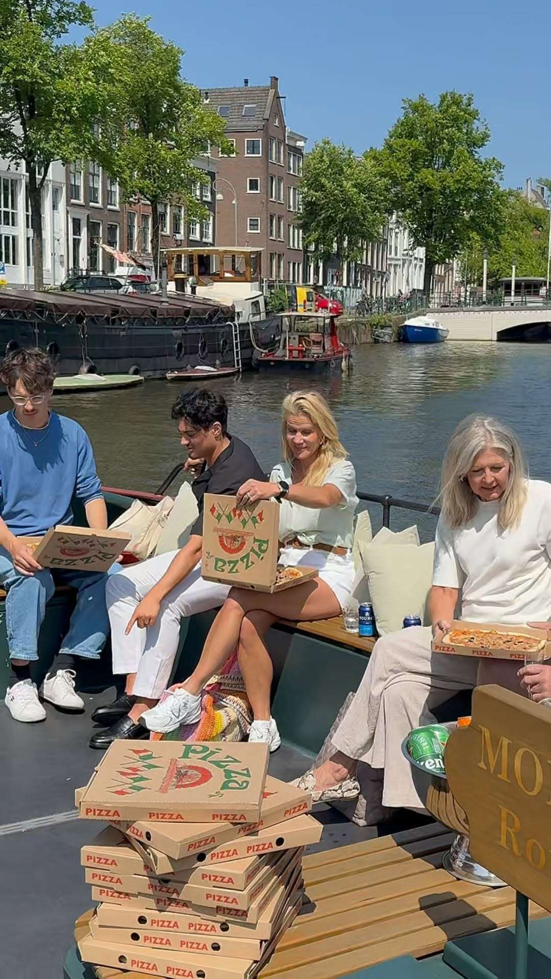 Cruising through the canals with pizza in one hand and a drink in the other?