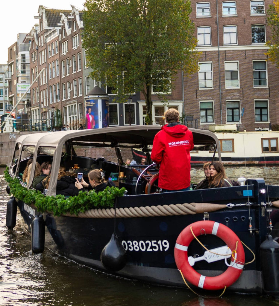 Cruise boat with Christmas decorations on Amsterdam's canals.